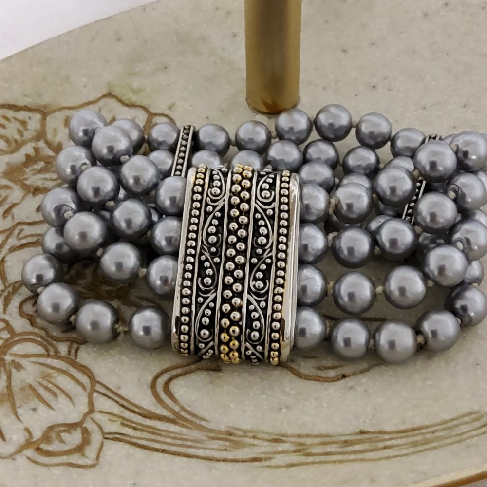Faux pearls and metal bracelet